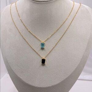 Emerald shaped coloured zircon necklace. Stainless steel.